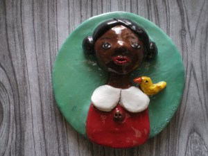 This is another tile that's painted with acrylic paint and then I added a clear spray coat to seal it and give it a shine.